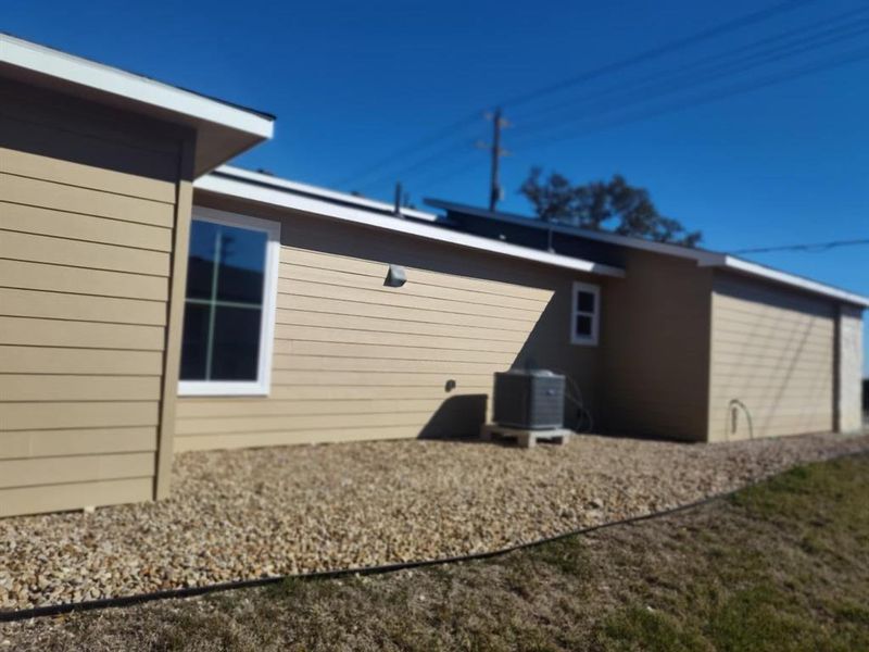 View of property exterior with a cooling unit View of property exterior with a cooling unit