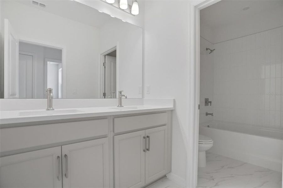 Furnished interior view inside a new home in Seaire, Parrish (Image 12).