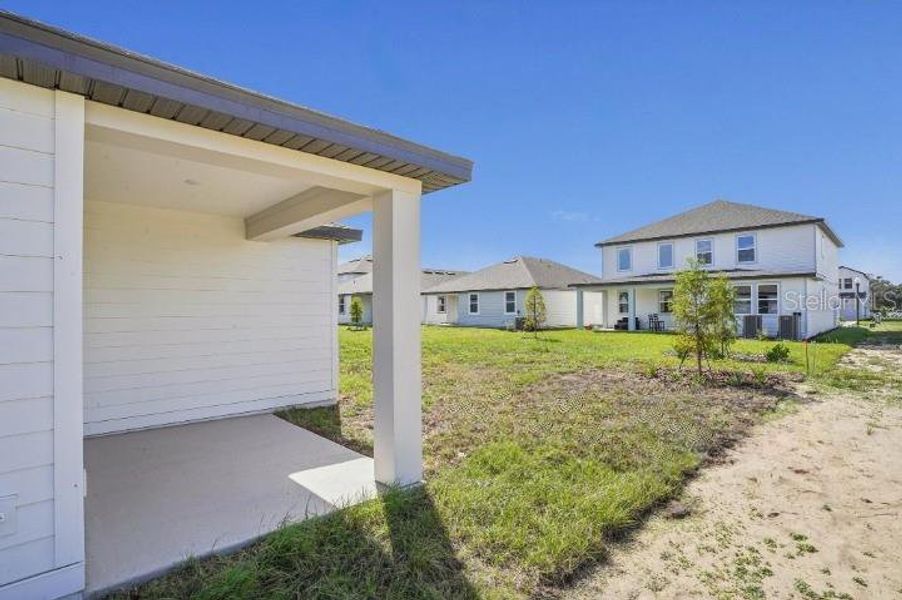 Exterior details and patio area of a home in Trailside, Mount Dora (Image 17). Exterior details and patio area of a home in Trailside, Mount Dora (Image 17).