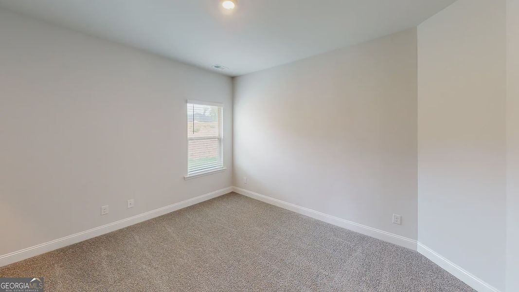 Spacious, unfurnished interior of a new home in Holliday Pass, Griffin (Image 26).
