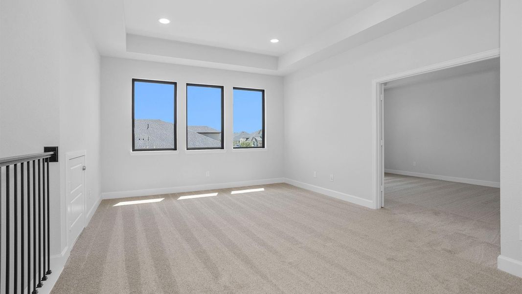 Spacious, unfurnished interior of a new home in Legacy Prairie at Katy Court, Katy (Image 10).