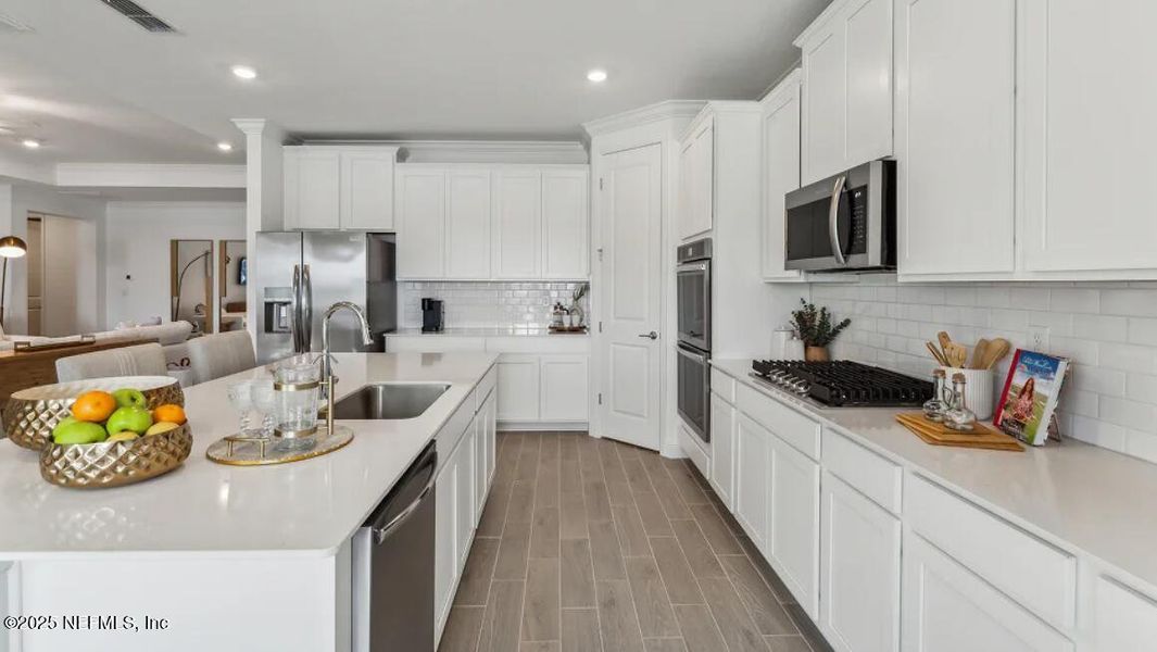 Furnished interior view inside a new home in Silver Meadows at SilverLeaf: Silver Meadows 60s, St. Augustine (Image 21).