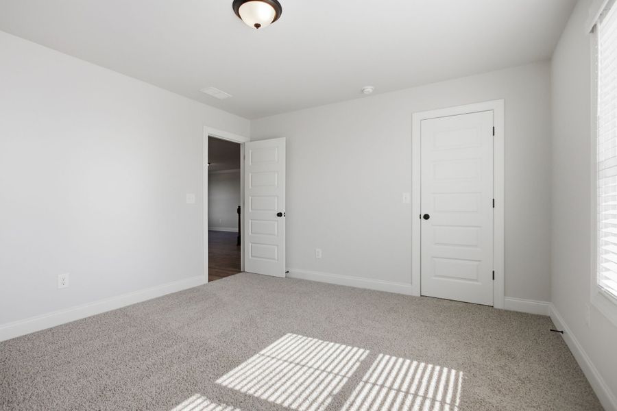 Spacious, unfurnished interior of a new home in Cherokee Knoll, Williamston (Image 30).