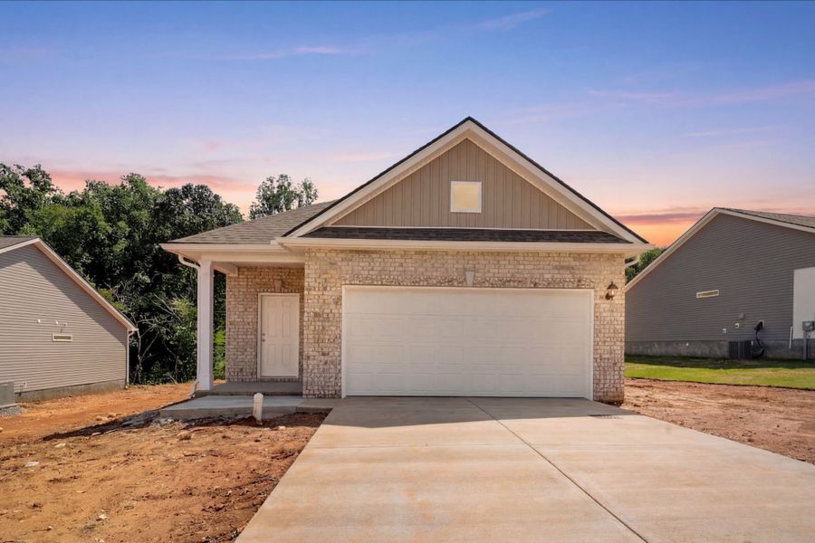 Front exterior of a new home in Jackson Hills, Clarksville, TN, highlighting curb appeal (Image 2). Front exterior of a new home in Jackson Hills, Clarksville, TN, highlighting curb appeal (Image 2).