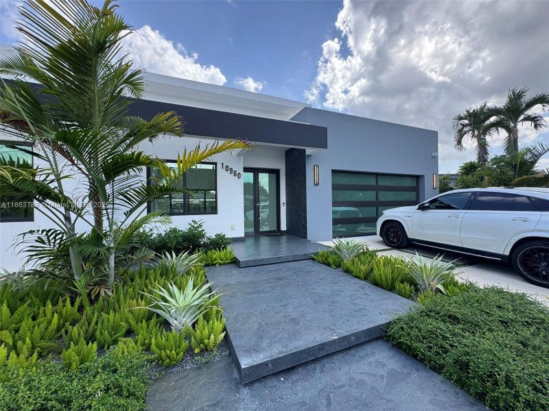 Front exterior of a new home in , Miami, FL, highlighting curb appeal (Image 26).