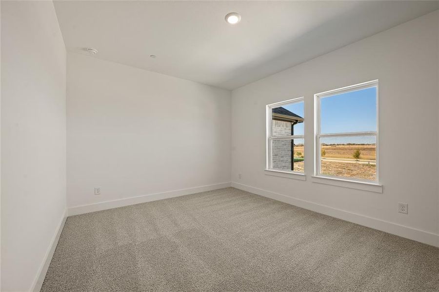Spacious, unfurnished interior of a new home in Talia, Mesquite (Image 23).