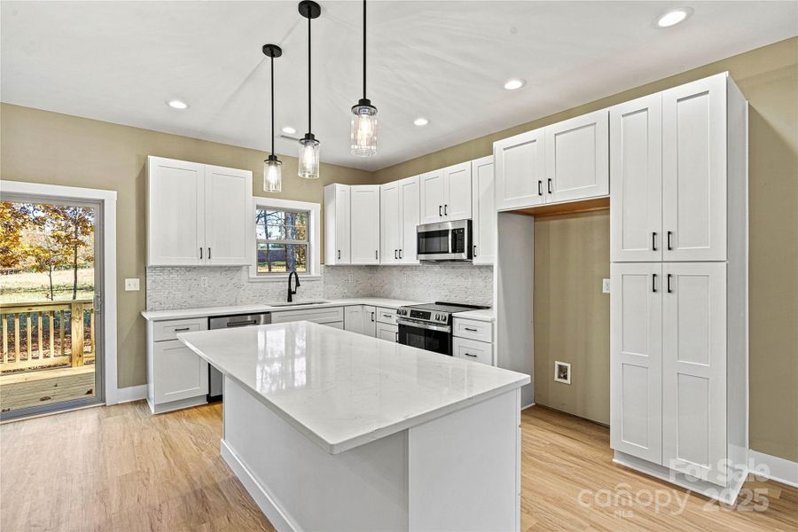 Furnished interior view inside a new home in , Newton (Image 6).