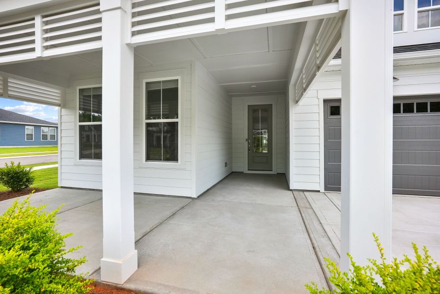 Exterior details and patio area of a home in Carolina Riverside, Belmont (Image 3).