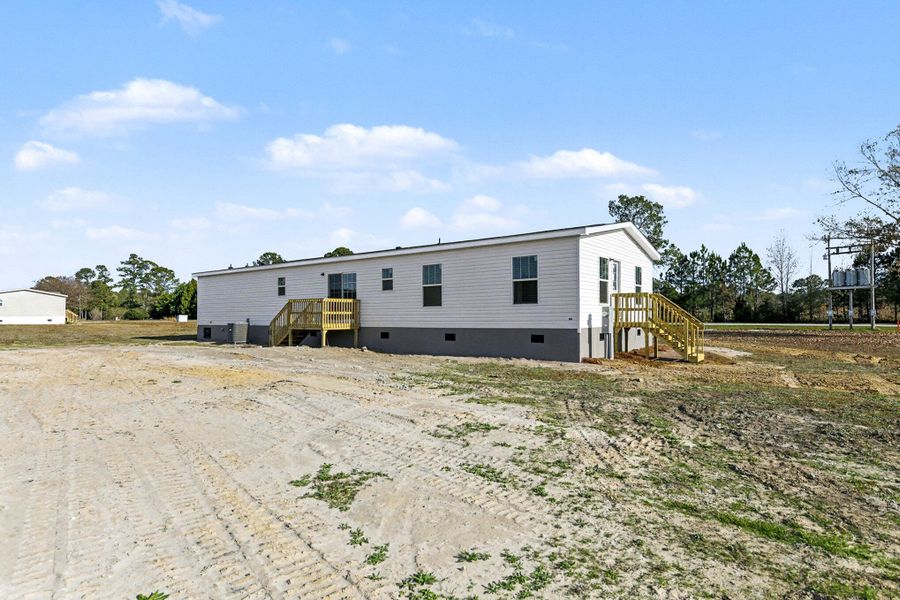 Exterior details and patio area of a home in , Ridgeville (Image 15). Exterior details and patio area of a home in , Ridgeville (Image 15).