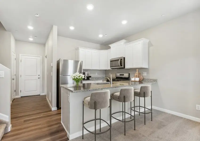 The Loveland is a beautiful 3 bedroom home with spacious rooms.