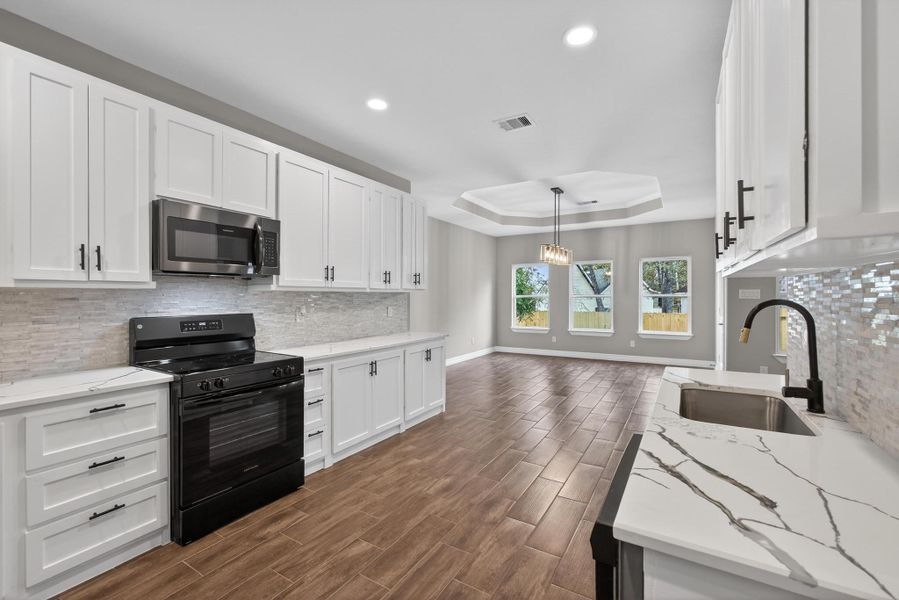 Furnished interior view inside a new home in , Willis (Image 13).