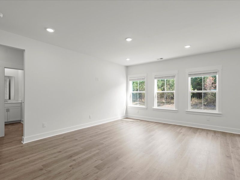 Spacious, unfurnished interior of a new home in The Coves at Lakes of Cane Bay, Summerville (Image 17). Spacious, unfurnished interior of a new home in The Coves at Lakes of Cane Bay, Summerville (Image 17).