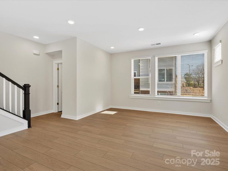 Spacious, unfurnished interior of a new home in Central Living at Craig, Charlotte (Image 16).