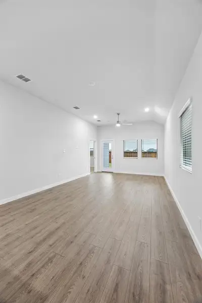 Living Room in the Cedar home plan by Trophy Signature Homes – REPRESENTATIVE PHOTO