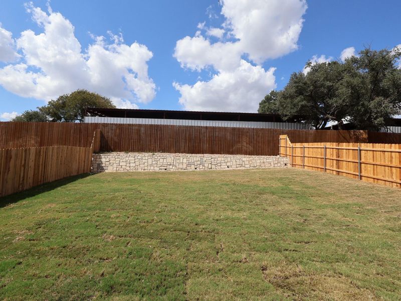 Exterior details and patio area of a home in Edgewood, Leander (Image 19). Exterior details and patio area of a home in Edgewood, Leander (Image 19).