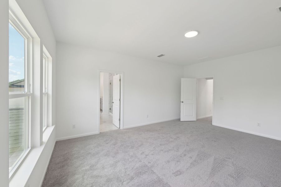 Representative unfurnished interior of a home built from the Jordan by Ashton Woods in Rowland's Grant, Fuquay Varina (Image 24).