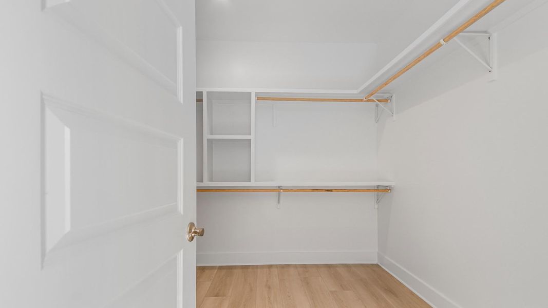 Representative unfurnished interior of a home built from the Jubilee by D.R. Horton in Breakfast Point East Phase II, Panama City Beach (Image 20).