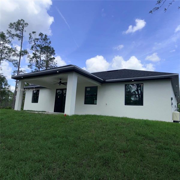 Exterior details and patio area of a home in , Lehigh Acres (Image 20).