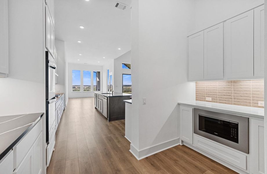 Furnished interior view inside a new home in Lariat - 80', Liberty Hill (Image 6). Furnished interior view inside a new home in Lariat - 80', Liberty Hill (Image 6).