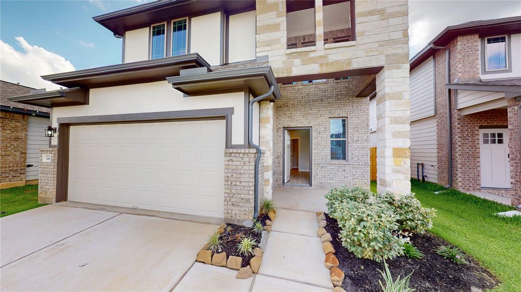 Exterior details and patio area of a home in Granger Pines, Conroe (Image 2). Exterior details and patio area of a home in Granger Pines, Conroe (Image 2).