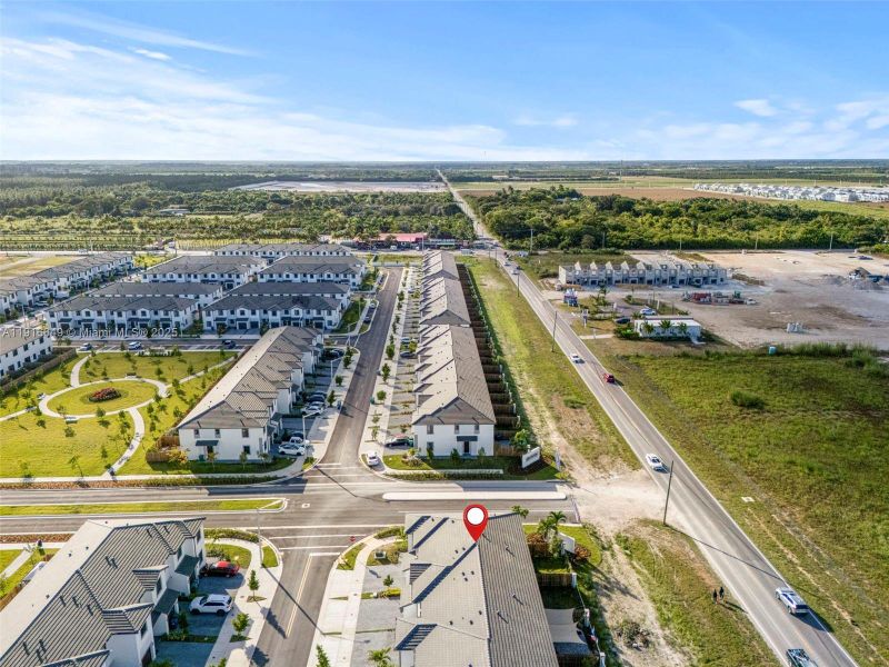 Front exterior of a new home in , Homestead, FL, highlighting curb appeal (Image 24). Front exterior of a new home in , Homestead, FL, highlighting curb appeal (Image 24).