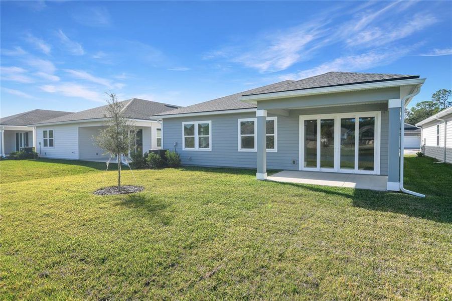 Exterior details and patio area of a home in Seminole Palms, Palm Coast (Image 21).