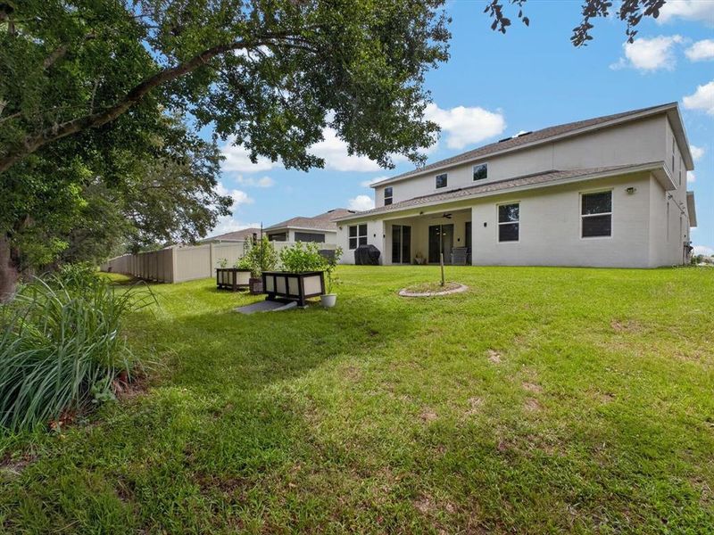 Exterior details and patio area of a home in Storey Creek, Kissimmee (Image 29).