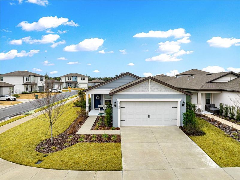 Front exterior of a new home in Pioneer Ranch, Ocala, FL, highlighting curb appeal (Image 22).