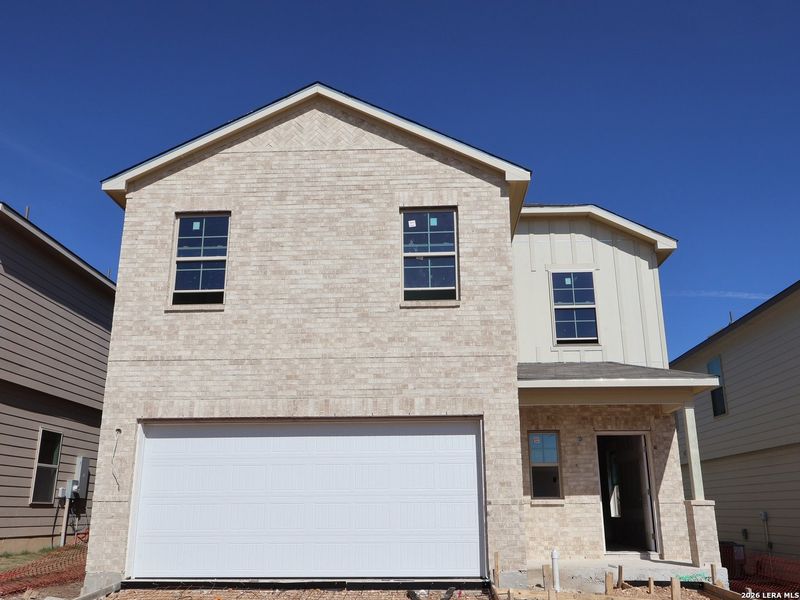 Front exterior of a new home in Paloma Park, Converse, TX, highlighting curb appeal (Image 20).