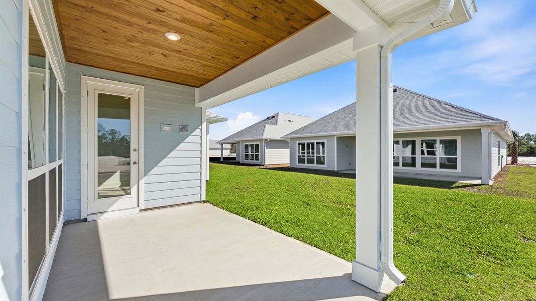 Exterior details and patio area of a home in WindMark Beach, Port Saint Joe (Image 21).