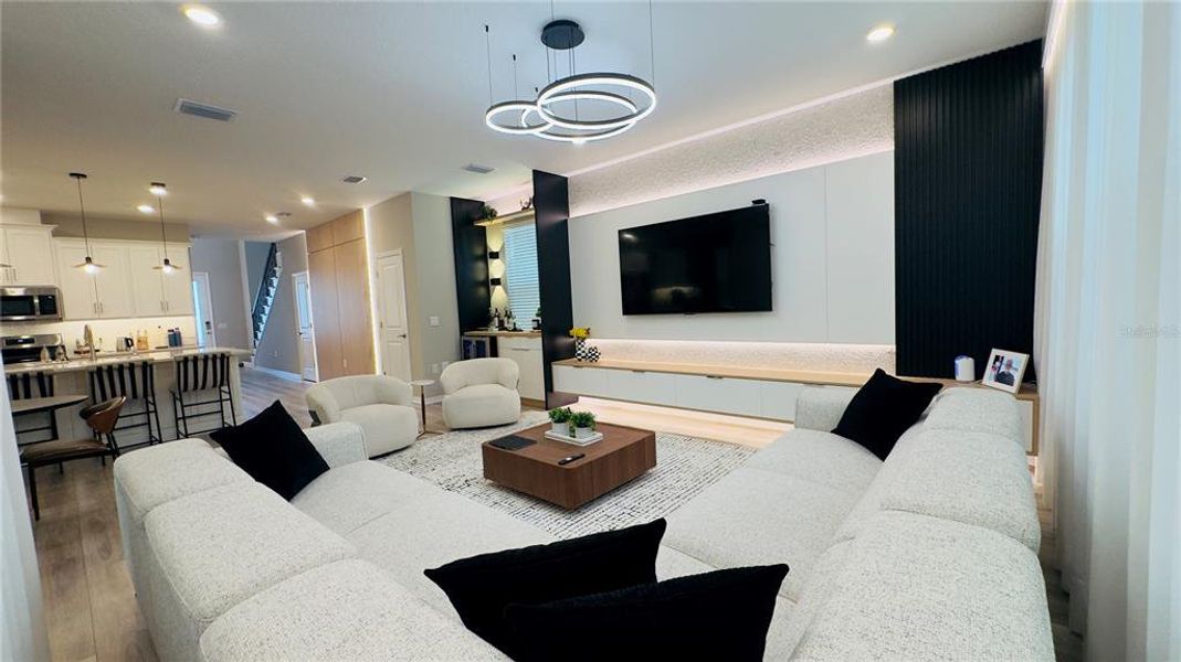 Furnished interior view inside a new home in Harvest at Ovation, Winter Garden (Image 8).