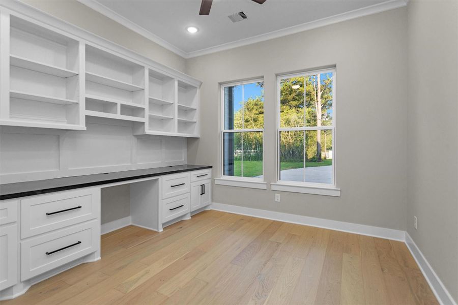 Private study with custom built-ins, ideal for working from home in comfort and style. Private study with custom built-ins, ideal for working from home in comfort and style.