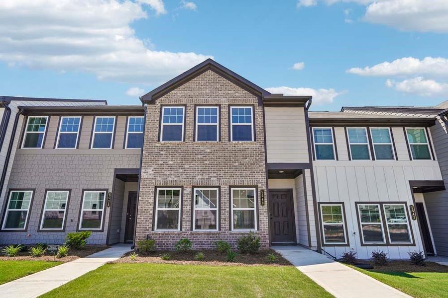 Front exterior of a new home in Laurelwood, Douglasville, GA, highlighting curb appeal (Image 2). Front exterior of a new home in Laurelwood, Douglasville, GA, highlighting curb appeal (Image 2).