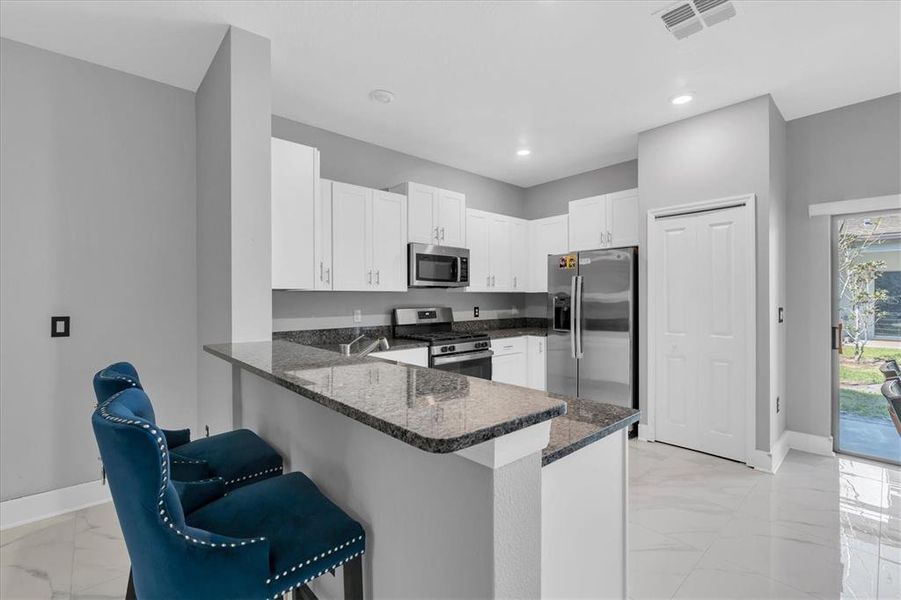 Furnished interior view inside a new home in , New Port Richey (Image 12).
