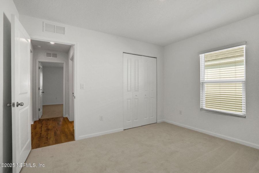 Spacious, unfurnished interior of a new home in Cordova Palms, St. Augustine (Image 25).