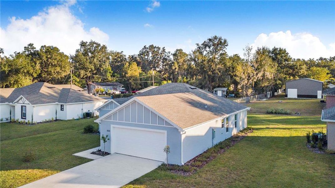 Front exterior of a new home in , Fort Meade, FL, highlighting curb appeal (Image 22). Front exterior of a new home in , Fort Meade, FL, highlighting curb appeal (Image 22).