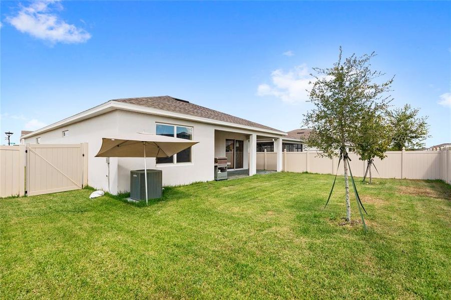 Front exterior of a new home in , Kissimmee, FL, highlighting curb appeal (Image 2). Front exterior of a new home in , Kissimmee, FL, highlighting curb appeal (Image 2).