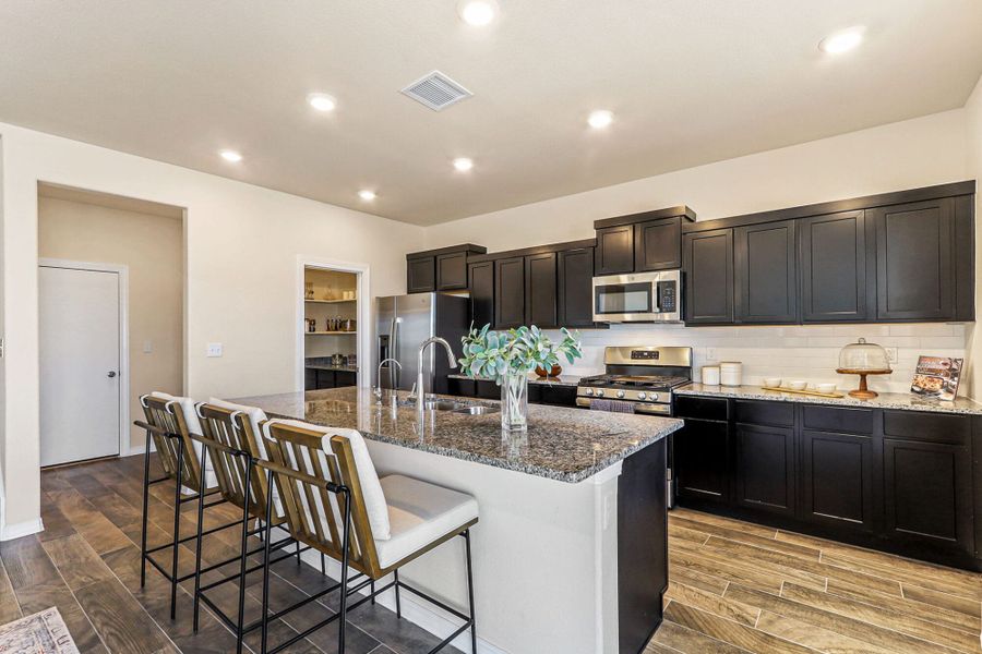 Representative furnished interior of a home built from the Blue Agave by View Homes in Paseos Del Este, Horizon City (Image 21).