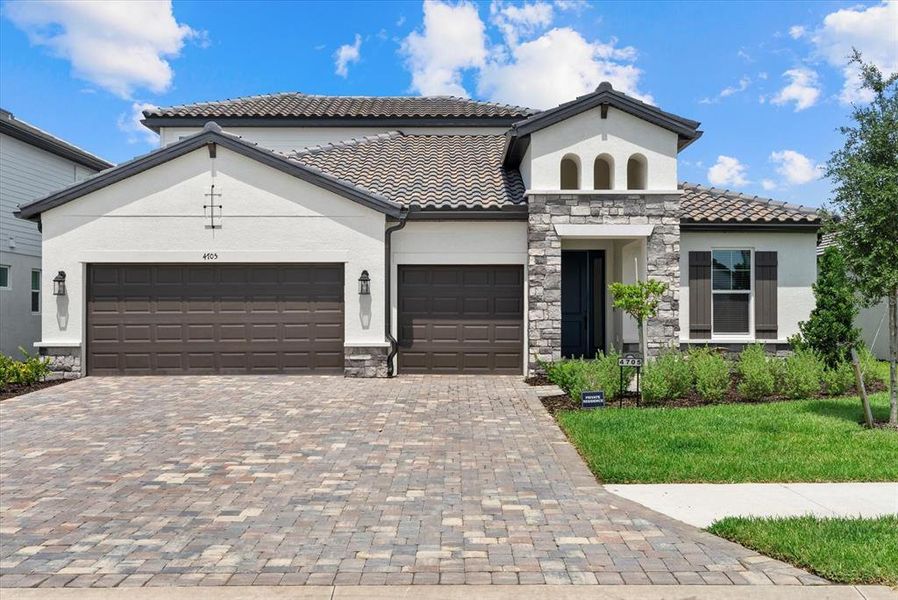 Front exterior of a new home in , Bradenton, FL, highlighting curb appeal (Image 1). Front exterior of a new home in , Bradenton, FL, highlighting curb appeal (Image 1).
