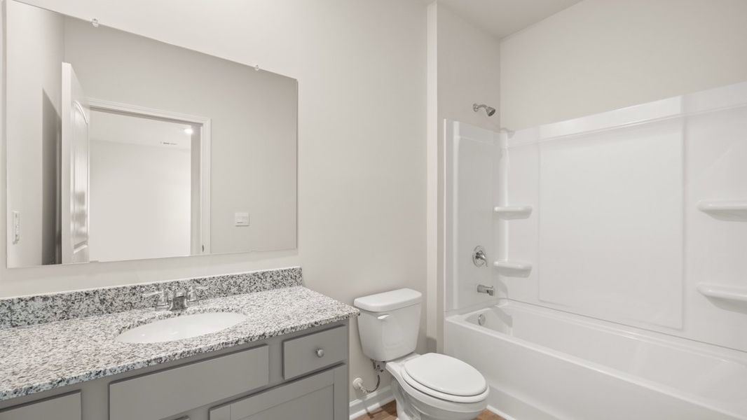 Representative furnished interior of a home built from the Mansfield by D.R. Horton in Northwoods at Mirror Lake, Villa Rica (Image 11). Representative furnished interior of a home built from the Mansfield by D.R. Horton in Northwoods at Mirror Lake, Villa Rica (Image 11).