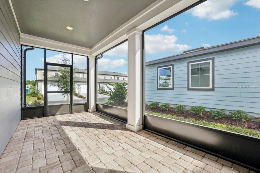 Exterior details and patio area of a home in Northlake Classical, Winter Garden (Image 16).