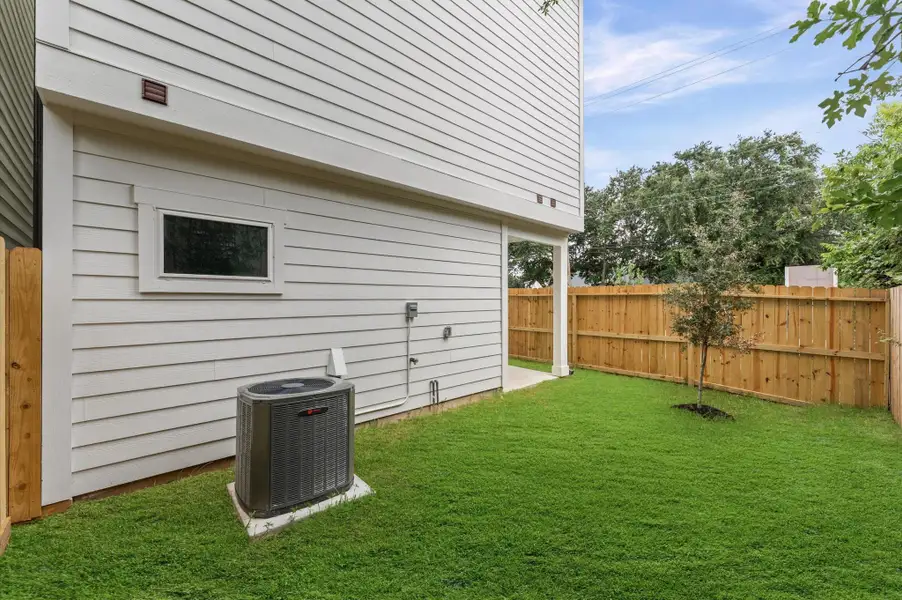 Exterior details and patio area of a home in , Houston (Image 3). Exterior details and patio area of a home in , Houston (Image 3).