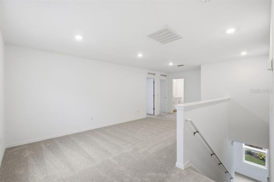 Spacious, unfurnished interior of a new home in Waterstone, Groveland (Image 45).