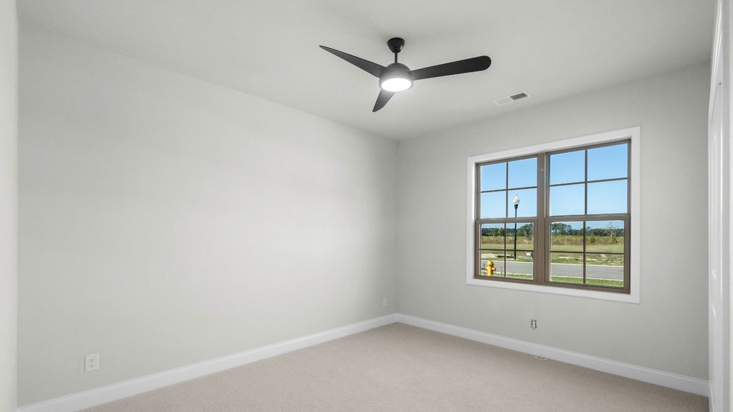 Spacious, unfurnished interior of a new home in Courtyards by Carrell, Ocean Isle Beach (Image 13). Spacious, unfurnished interior of a new home in Courtyards by Carrell, Ocean Isle Beach (Image 13).