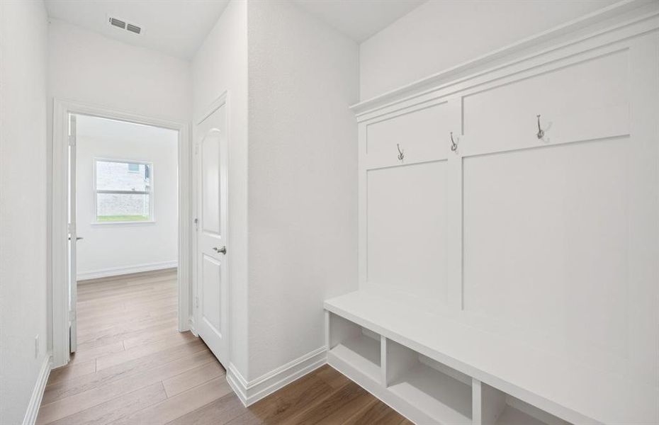 Everyday Entry from garage with mud bench