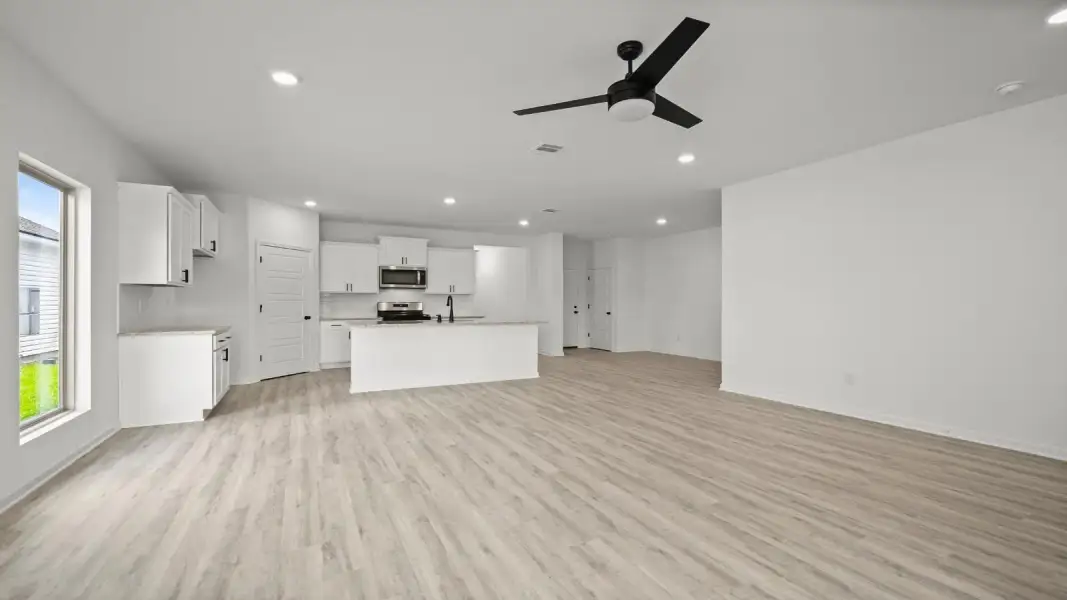 Representative unfurnished interior of a home built from the Lacombe by D.R. Horton in Brookwater, Texas City (Image 13). Representative unfurnished interior of a home built from the Lacombe by D.R. Horton in Brookwater, Texas City (Image 13).