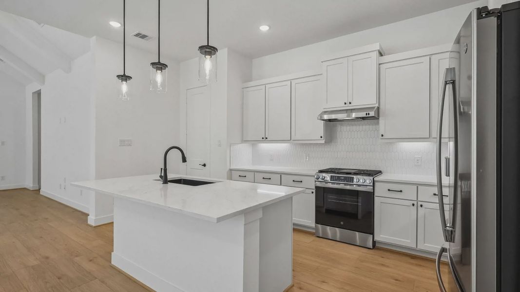 Representative furnished interior of a home built from the Oxford by Chesmar Homes in Parkside on the River, Georgetown (Image 6).