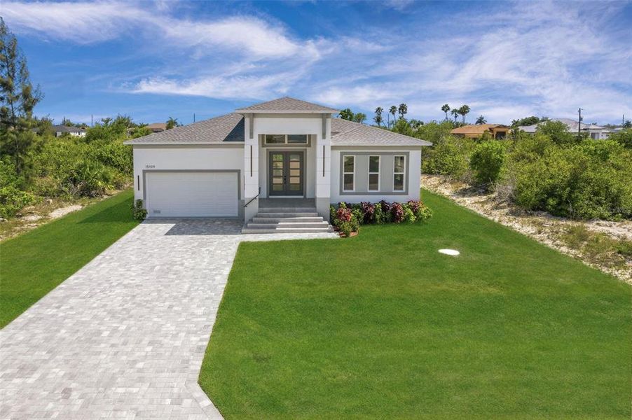 Front exterior of a new home in , Port Charlotte, FL, highlighting curb appeal (Image 28).
