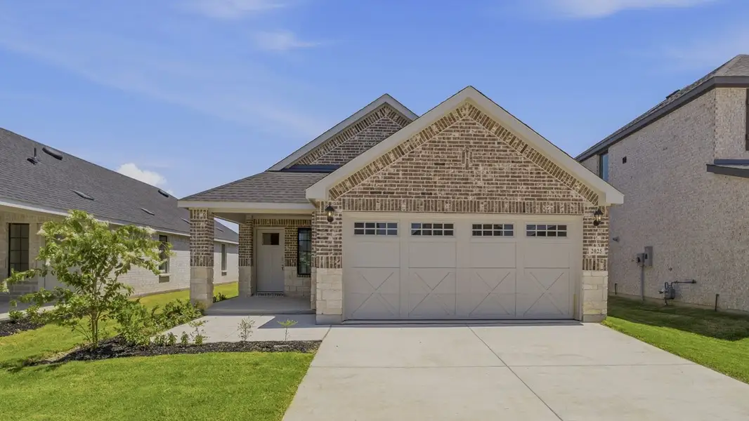 Representative exterior photo of a completed home built from the Allegra by D.R. Horton in Windchime, Celina, TX (Image 13).