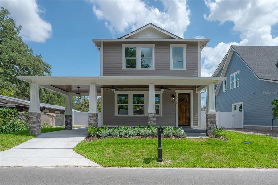 Front exterior of a new home in , Tampa, FL, highlighting curb appeal (Image 1). Front exterior of a new home in , Tampa, FL, highlighting curb appeal (Image 1).